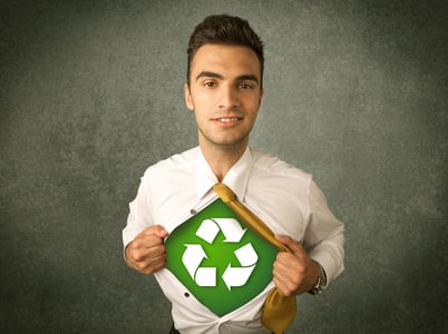 Enviromentalist business man tearing off shirt with recycle sign on his chest concept on backround